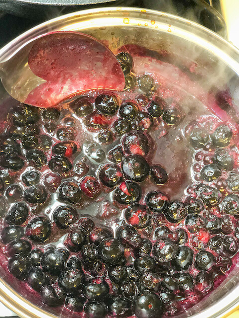 blueberries cooking in a saucepan