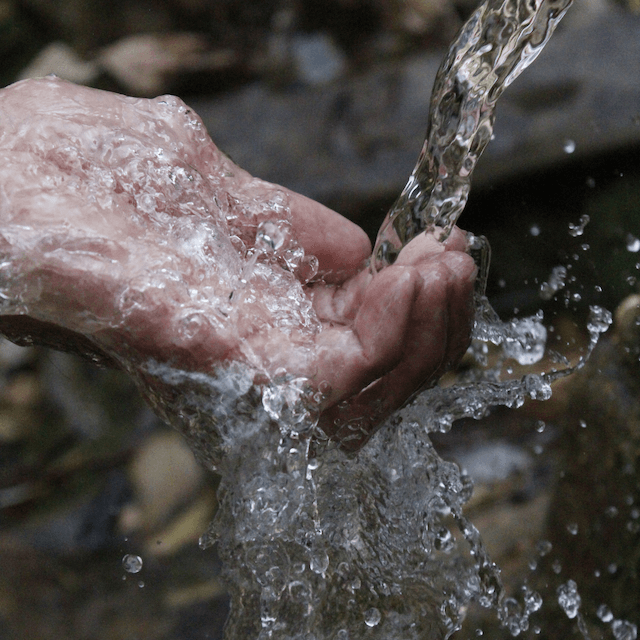 hand in spring water