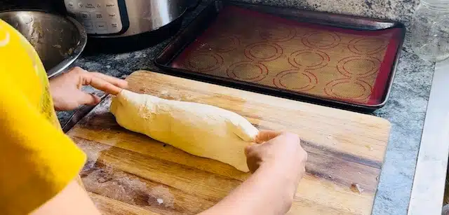 sourdough bagel dough in a tube shape